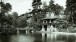 Topridge from Upper St Regis Lake, the main house at left, with ‘honeymoon cottage’ at right.