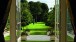 The garden seen from the Gallery. On the famously manicured lawn stands The Extended Shadow, a lead sculpture by Shirazah Houshiary, 1994.