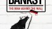 Cover of Banksy: The Man Behind the Wall