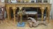 A water gilded George II style buffet with two Regency winged monopodia for restoration