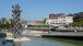 View across the Nervión from the Guggenheim. Anish Kapoor sculpture (right). university buildings (left) across the river