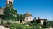 Castle with walled parterre, with Baldassare Peruzzi’s Renaissance circular brick chapel.