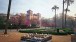 El Parque de Maria Luisa: The Plaza de América with the Pabellón Mudéjar, flowering Judas trees, date palms, low fountains & euonymus hedges