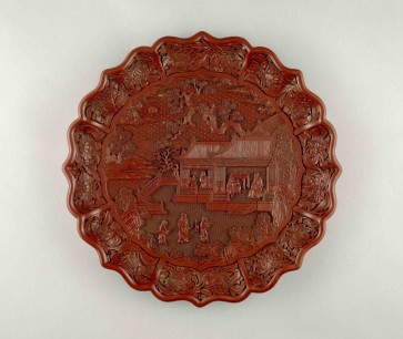 Carved red lacquer on wood core, Yongle mark and period 1403-24, South China. Diameter 34.8cm © The Trustees of the British Museum