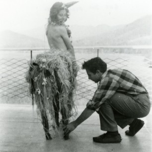 Robert Rauschenberg preparing a Mardi Gras costume. Black Mountain College. Photograph by Trude Guermonprez.