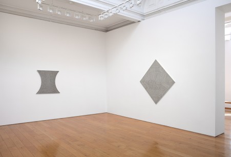 Iinstallation shot at Karsten Schubert, showing Climax, 1963 and Crest, 1964 both by Bridget Riley