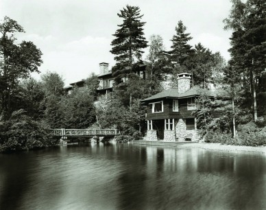 Topridge from Upper St Regis Lake, the main house at left, with ‘honeymoon cottage’ at right.