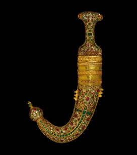 Indian jambiya in the Arabian style ; the gold hilt & sheath are decorated with rubies, emeralds & diamonds, India, 19th century.  Formerly in the collection of the Nizam of Hyderabad