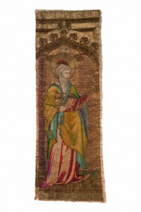 Panel depicting a saint French, c.1400, linen, embroidered with coloured silks in split stitch with silver-gilt & silver thread in various forms of couched work 743 x 272 mm Acc. no. 3032.1; E2/39/5