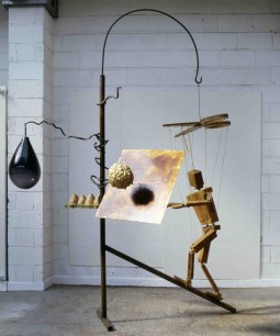 Bill Woodrow RA, Beekeeper and Four Hives (1997) Glass, urethane foam, wood, steel, wax, rope, gold leaf, shellac, 300x220x174 cm  Collection of the artist