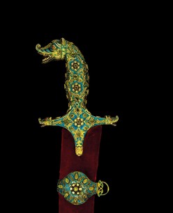 Indian sword shamshir: Iranian watered steel blade; silver-gilt hilt decorated with enamel & set with clusters of diamonds & emeralds; scabbard fitted with a chape & suspension rings decorated en suite with hilt. North India, Rajasthan, 18th–19th centurie