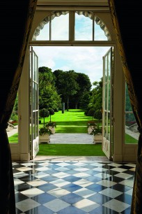 The garden seen from the Gallery. On the famously manicured lawn stands The Extended Shadow, a lead sculpture by Shirazah Houshiary, 1994.