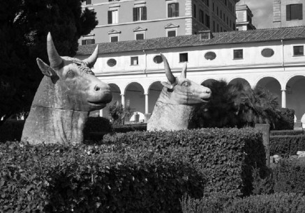 Two of the carved animal heads that used to adorn the Temple of Deified Trajan, now in the courtyard of S. Maria degli Angeli