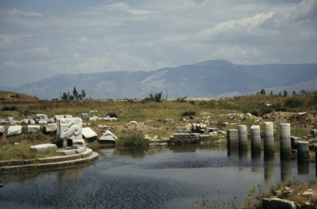 Fragments of the Roman Harbour monument (left) and a few remaining columns of the Hellenistic Stoa that once defined the southern side of the harbour (right)