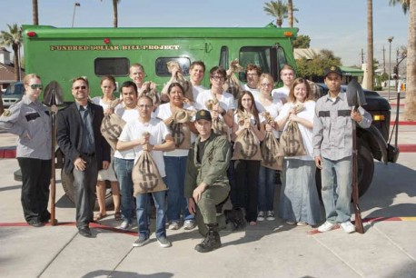 University of Arizona students, faculty and visitors hand over bags full of Fundred Dollar Bills to the armored truck in Tempe, AZ.