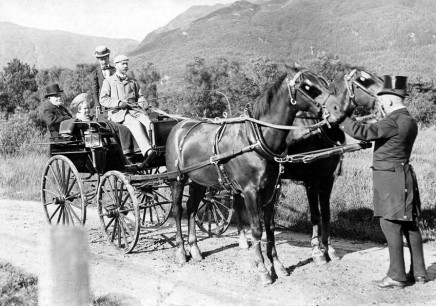 Alex Reid driving the family horse-drawn carriage with (left to right) James, McNeill and Ada Reid