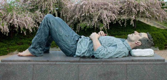 Sean Henry. Lying Man, 2003. Bronze and oil paint, 82 x 155 x 76 inches. Frederik Meijer Gardens & Sculpture Park, Grand Rapids, Michigan. Gift of Fred and Lena Meijer.