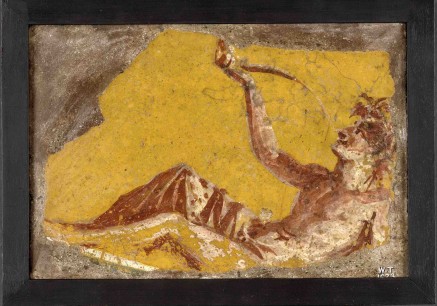 C. Fragment of a wall painting showing a man reclining to drink. From Pompeii, 1st century AD. © the Trustees of the British Museum