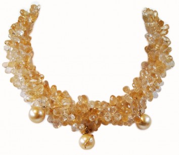 Three unusual golden South Sea pearls can be seen on this citrine necklace