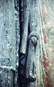 Saint-Maurice, Angers, left jamb 2 (detail): pendant baubles, sleeve knot, mantle.