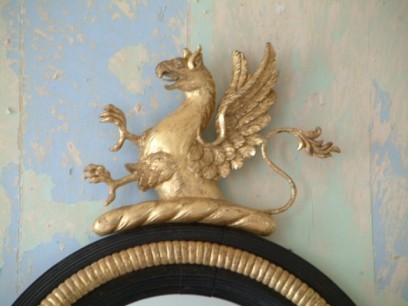 An heraldic gryphon on  a Regency convex mirror © Martin Body, Giltwood Restoration