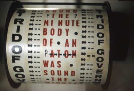 Liliane Lijn, Get Rid of Government Time Poem Machine, 1962 35x38.2x35cm Letraset on painted metal drum, plastic,painted metal,motor. Words from a poem of Nazli Nour. Photo: Stephen Weiss courtesy Liliane Lijn An early work in my Poem Machine series.