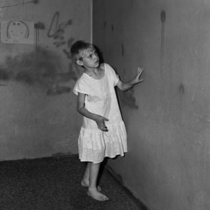 Roger Ballen, Girl in White Dress (2002)