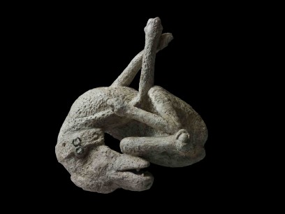 H. Plaster cast of a dog. From the House of Orpheus, Pompeii, AD 79. © Soprintendenza Speciale per i Beni Archeologici di Napoli e Pompei/Trustees of the British Museum