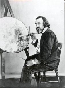 Henry Hering, Portrait photograph of Richard Dadd painting Contradiction (c.1875), photograph, Bethlem Museum of the Mind