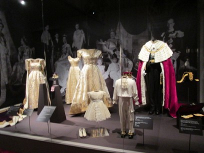 Case exhibiting robes worn by The Duke of Edinburgh, and costumes of Prince Charles and Princess Anne