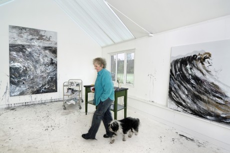 Maggi Hambling with her dog Lux, in her studio