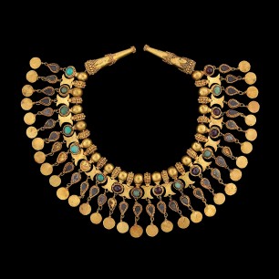 Ornament for the neck of a robe (Tillya Tepe, Tomb V), 1st century BC–1st century AD. Gold, turquoise, garnet, and pyrite, diameter: 12.5 cm