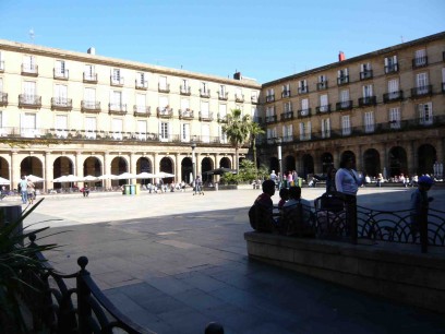 Plaza Nueva - new in the 19th century. At lunchtime the natives stay out of the sun in the cool colonnades