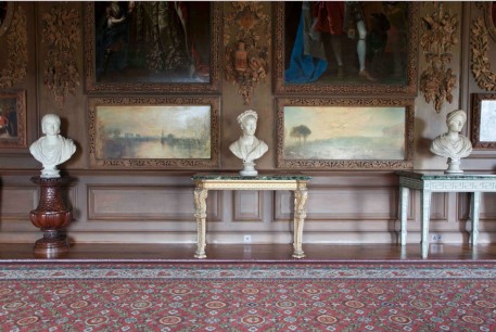 Petworth House, the Carved Room , © Antony Crolla. The panel paintings are by JMW Turner' the wall carvings are by Grinling Gibbons