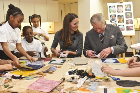 Children show their art projects to their Royal Highnesses the Prince of Wales and the Duchess of Cambridge