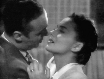 Iscovescu (Charles Boyer) and Emmy Brown (Olivia de Havilland) in Hold Back the Dawn (1941).