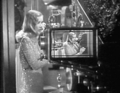 Veronica Lake playing herself playing the singer Sally Vaughn in Hold Back the Dawn.