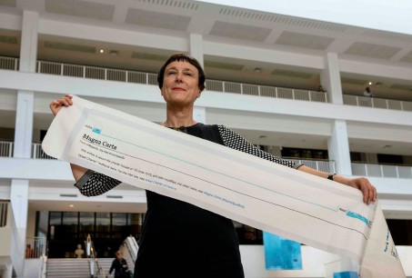 Cornelia Parker with a fragment of Magna Carta (An Embroidery) at the British Library (PhotoTony Antoniou)