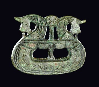 Brooch shaped like a ship, 800–1050. Tjørnehøj II, Fyn, Denmark. Copper alloy. ©The National Museum of Denmark