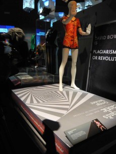 Kansai Yamamoto, 'Woodland Creatures' leather leotard made for Ziggy Stardust, displayed on giant mock-up of George Steiner's 'In Bluebeard's Castle  Or Some Notes Towards a Re-definition of Culture'