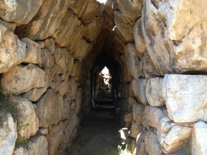 Tiryns: a passage through the massive stone walls. Photo: Stephen Kingsley