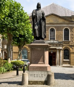 Wesley's chapel with statue of John Wesley. © The Museum of Methodism & Wesley’s Chapel