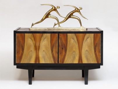 Yury Sluchevsky (supervisor), Stroganov Art School, Two-door cupboard (1960s), Nut wood, 57х 90х43cm AND Nikolay Silis, Skaters (Sculpture) (1960s) Bronze, 29х62х6 сm. Courtesy Heritage International Art Gallery