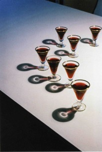 Bill Culbert, Small Glass Pouring Light, installation of found objects in light, 1983