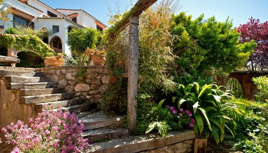 The gardens of the villa where Jacqueline and Ian have launched their business