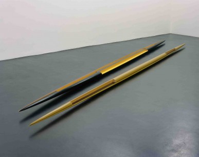 Isa Genzken, Rot-gelb-schwarzes Doppelellipsoid ‘Zwilling’ (Red-Yellow-Black Double Ellipsoid 'Twin'), 1982. Lacquered wood, two parts.  Part 1: 13x20.5x600 cm Part 2: 11x14x602 cm. Collection of the artist. Courtesy the artist & Galerie Buchholz, Cologne