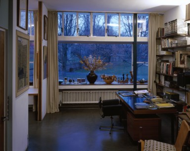 The Studio, with Erno Goldfinger's desk, looking to the window ledge which is covered with African figures. www.nationaltrust.org.uk