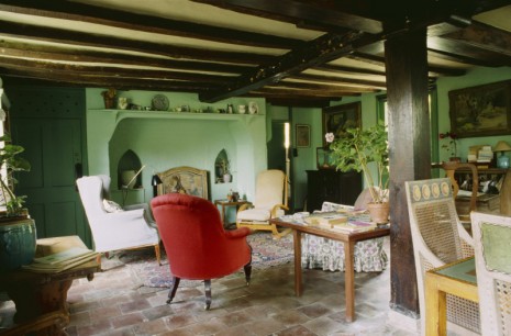 A view of the Sitting Room, painted in the green paint favoured by Virginia Woolf at Monk's House, East Sussex