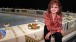 Judy Chicago with her work, The Dinner Party, at New York's Brooklyn Museum