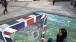 A spectator enjoys the 3D pavement art by 3D Joe and Max